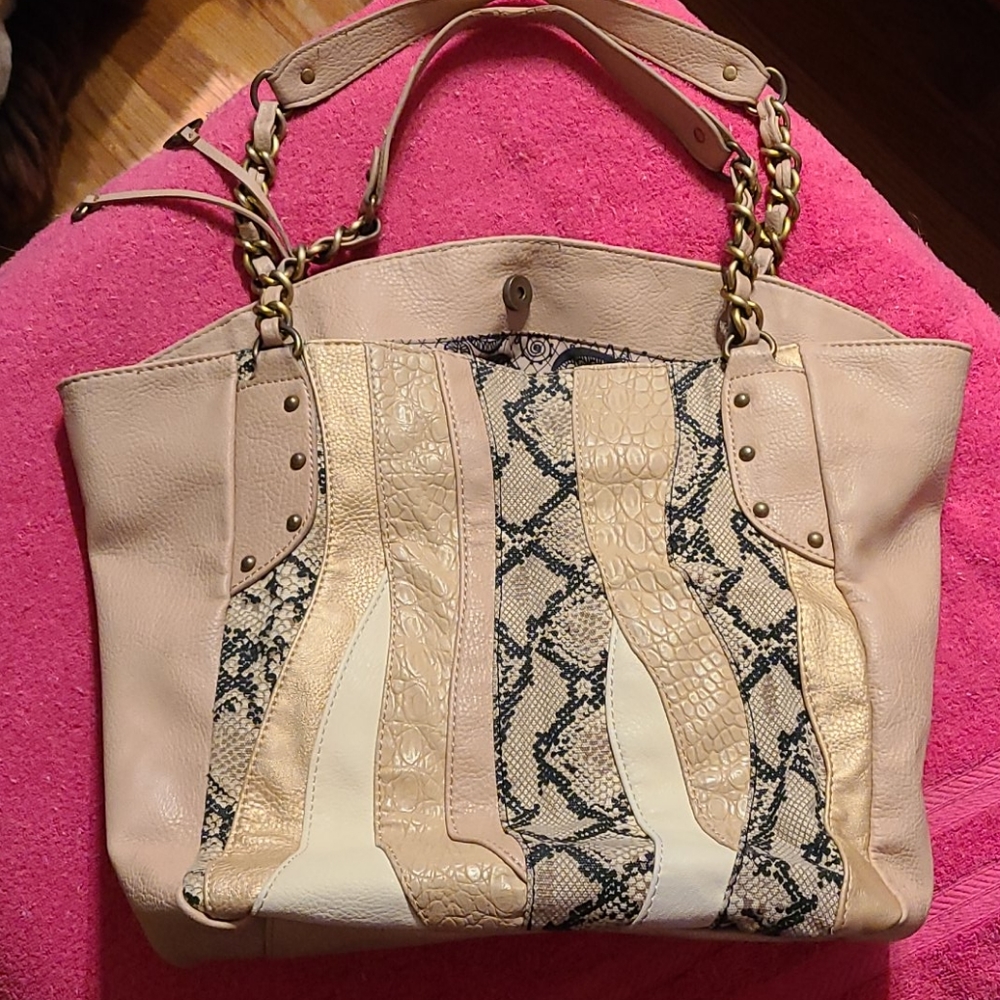 Carlos Santana purse